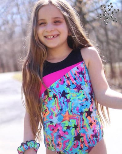 gymnast in blast off leotard pink black blue