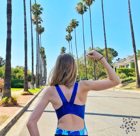 back of blue hydra gymnastics leotard