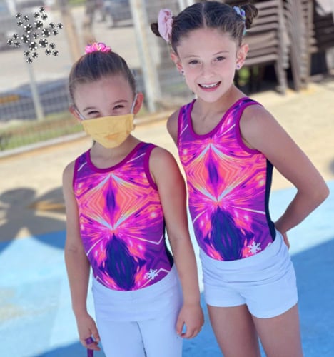 gymnasts in pink leotard