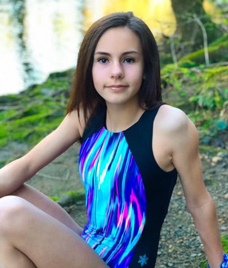 gymnast in snowflake designs leotard blue 