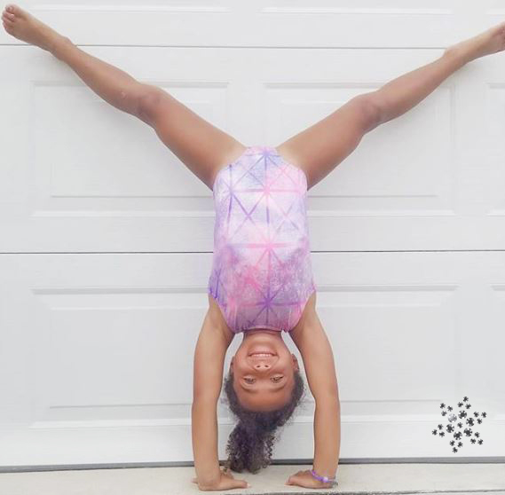 gymnast in a handstand