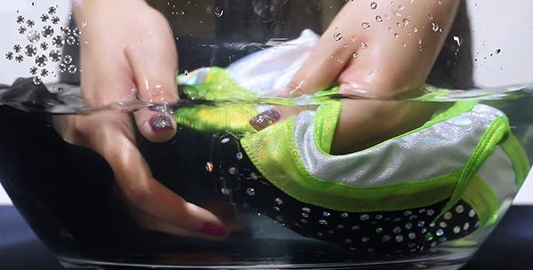 dunk leotard in water to clean