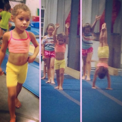 Gymnast doing handstand.