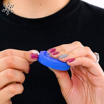 blue measuring tape to measure for a leotard
