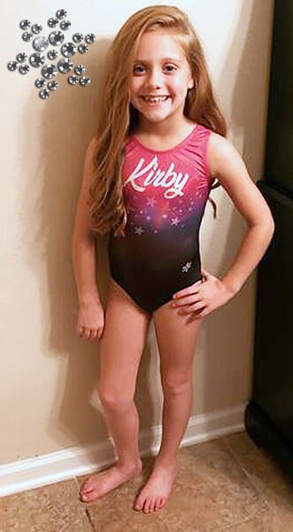 Gymnast in personalized leotard.